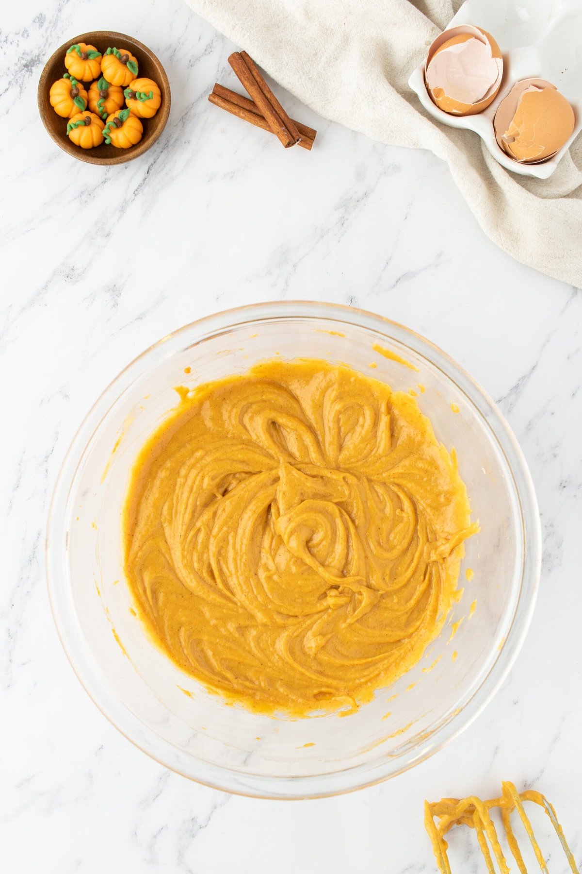 mixed pumpkin cupcake batter in a bowl