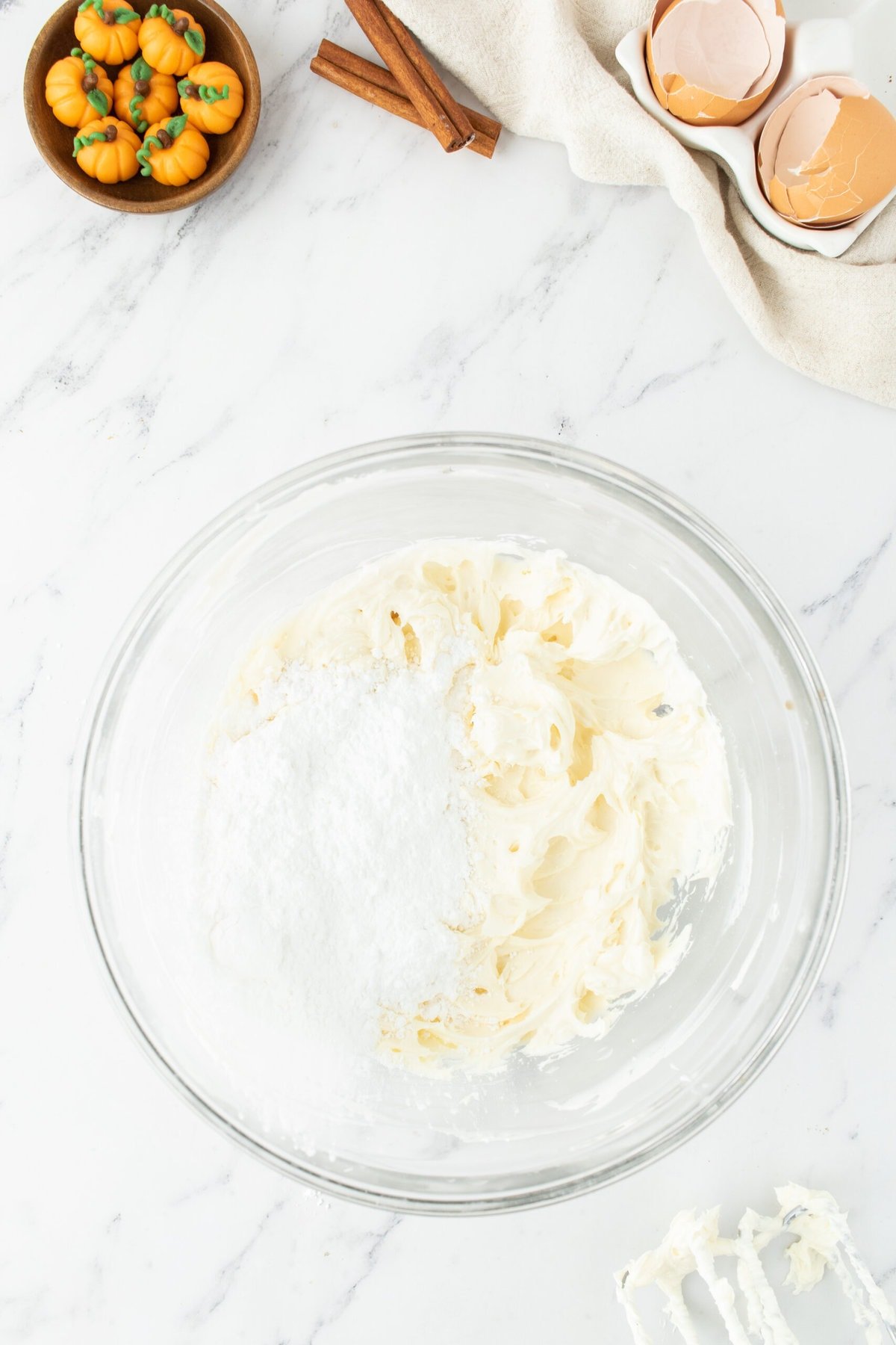 cream cheese icing mixed in a bowl