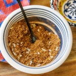 shawarma rub in a bowl with a small spoon in it