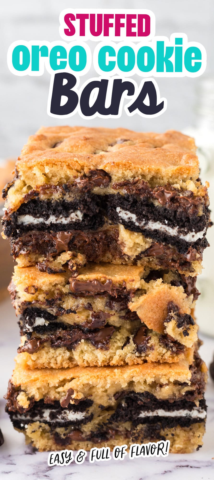 cookie bars stuffed with oreos stacked on top of each other on a table