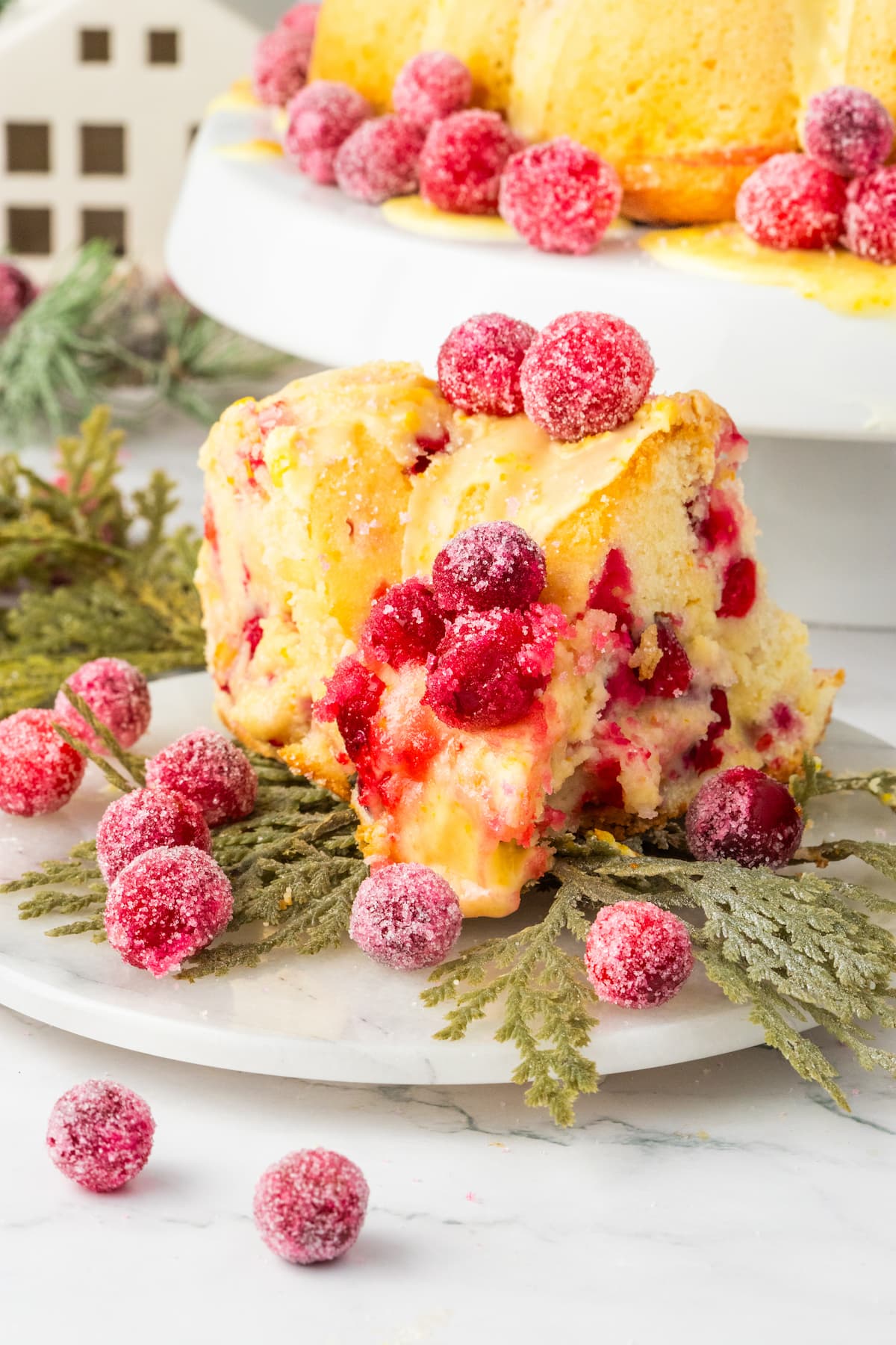 cranberries covered in sugar on a cake