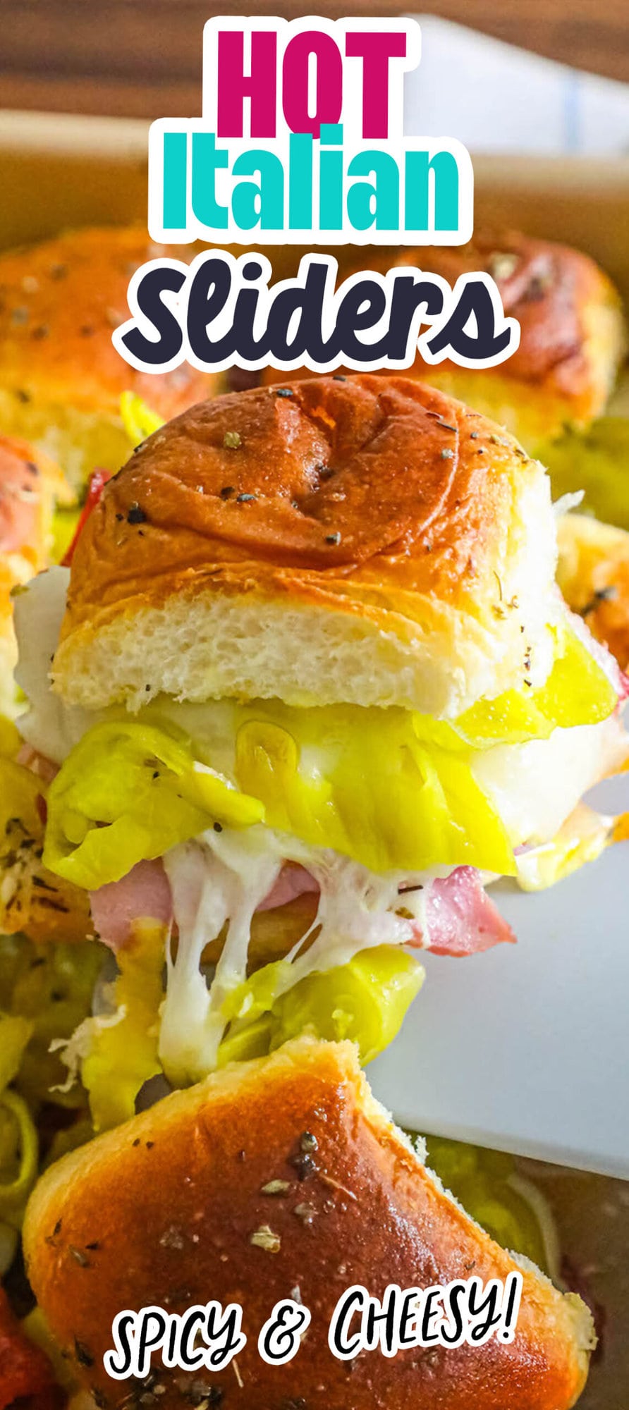 rolls with ham, cheese, and pepperoncini in between them
