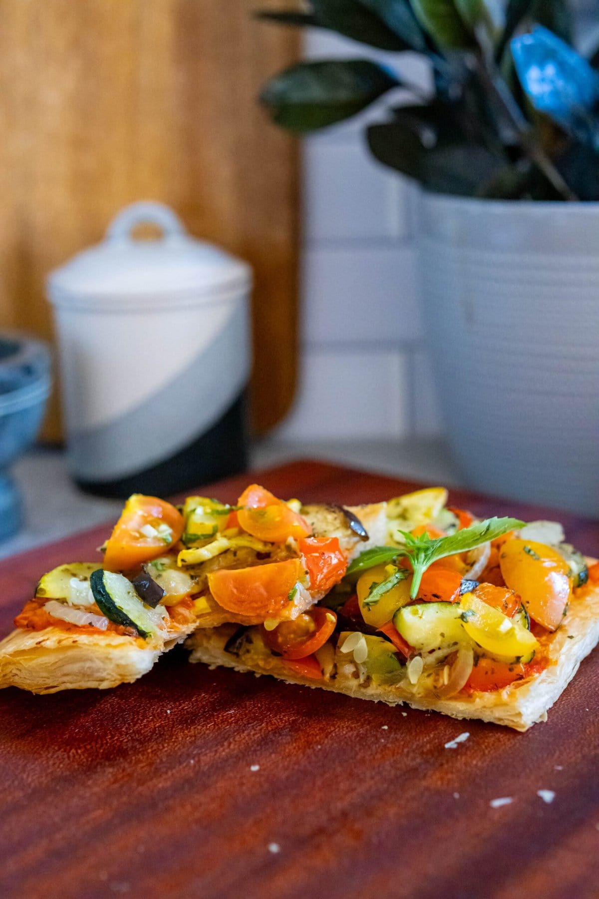 baked tarts with ratatouille on top on a table