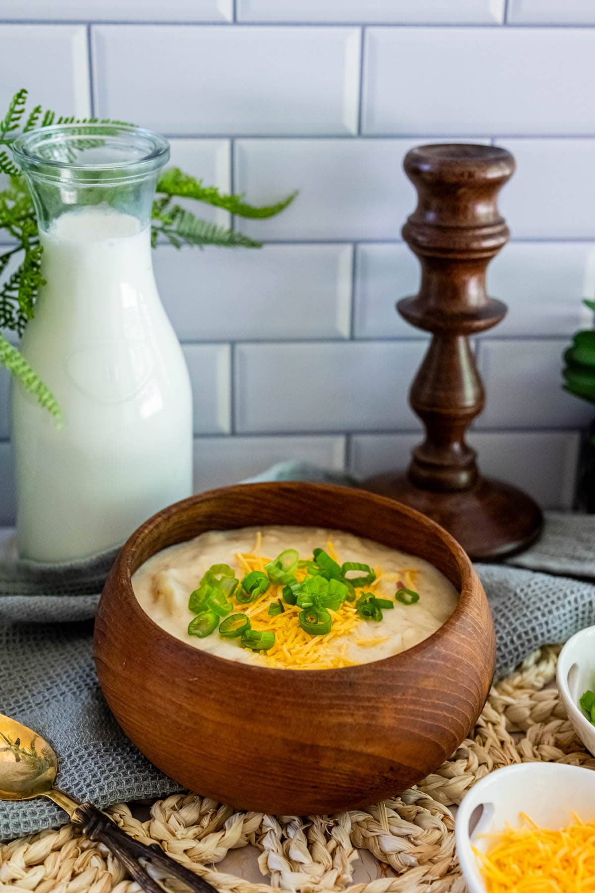 potato soup in a wood bowl