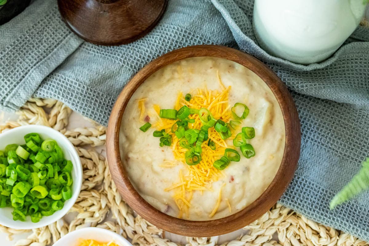 potato soup in a wood bowl