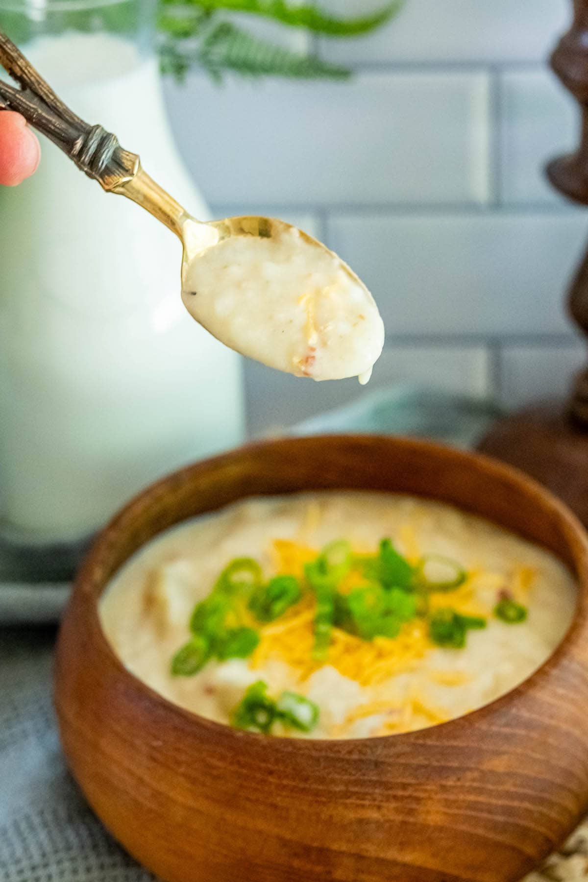 potato soup in a wood bowl