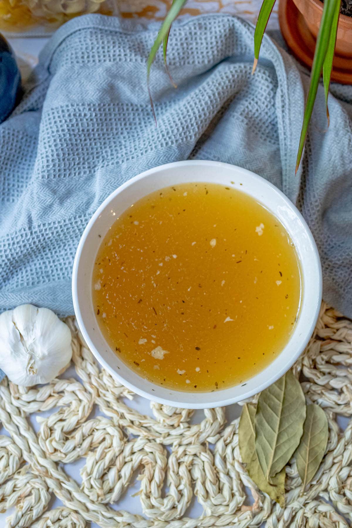 bowl of yellow stock in a bowl