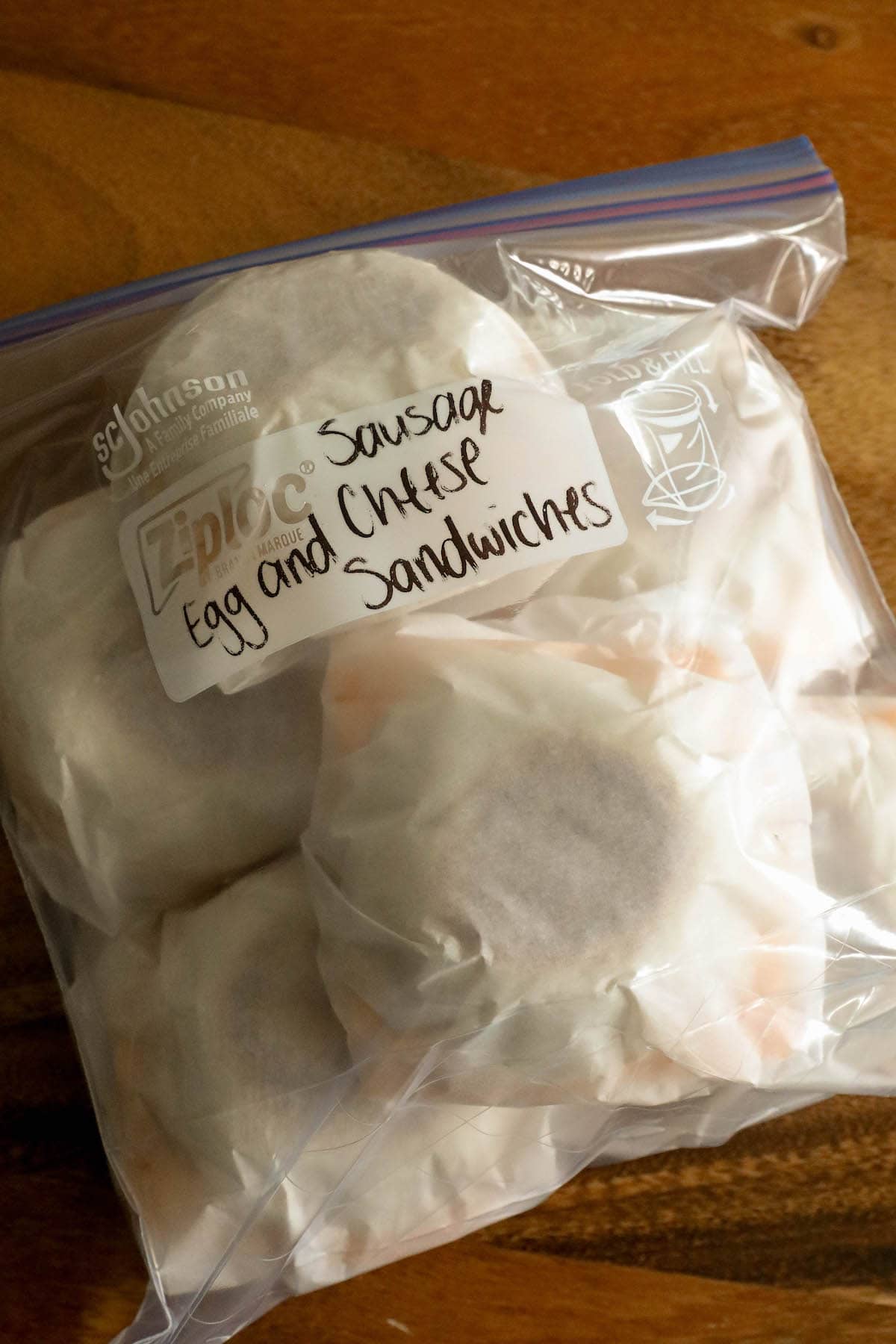 Frozen Sausage Egg Muffins in a plastic bag.