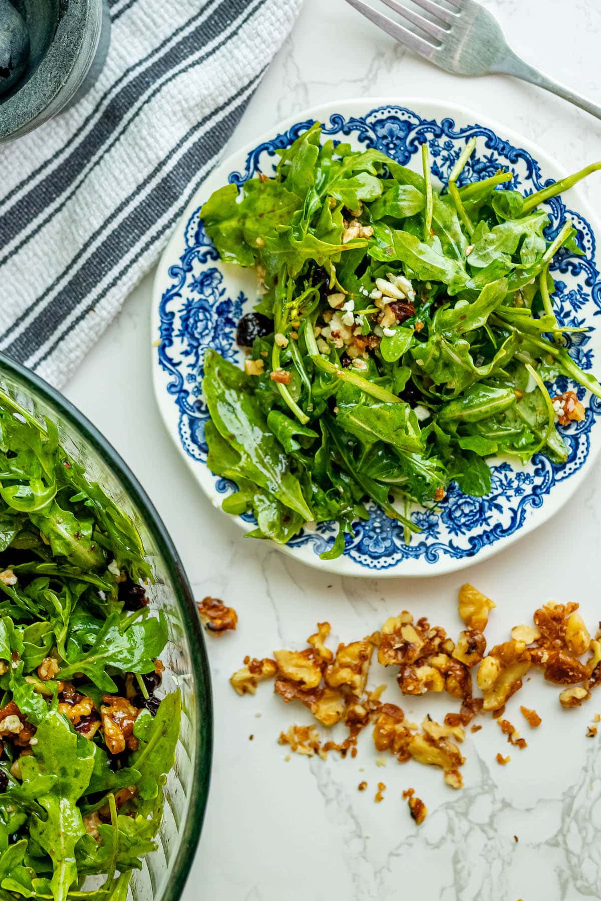 Arugula salad with walnuts and cranberries.