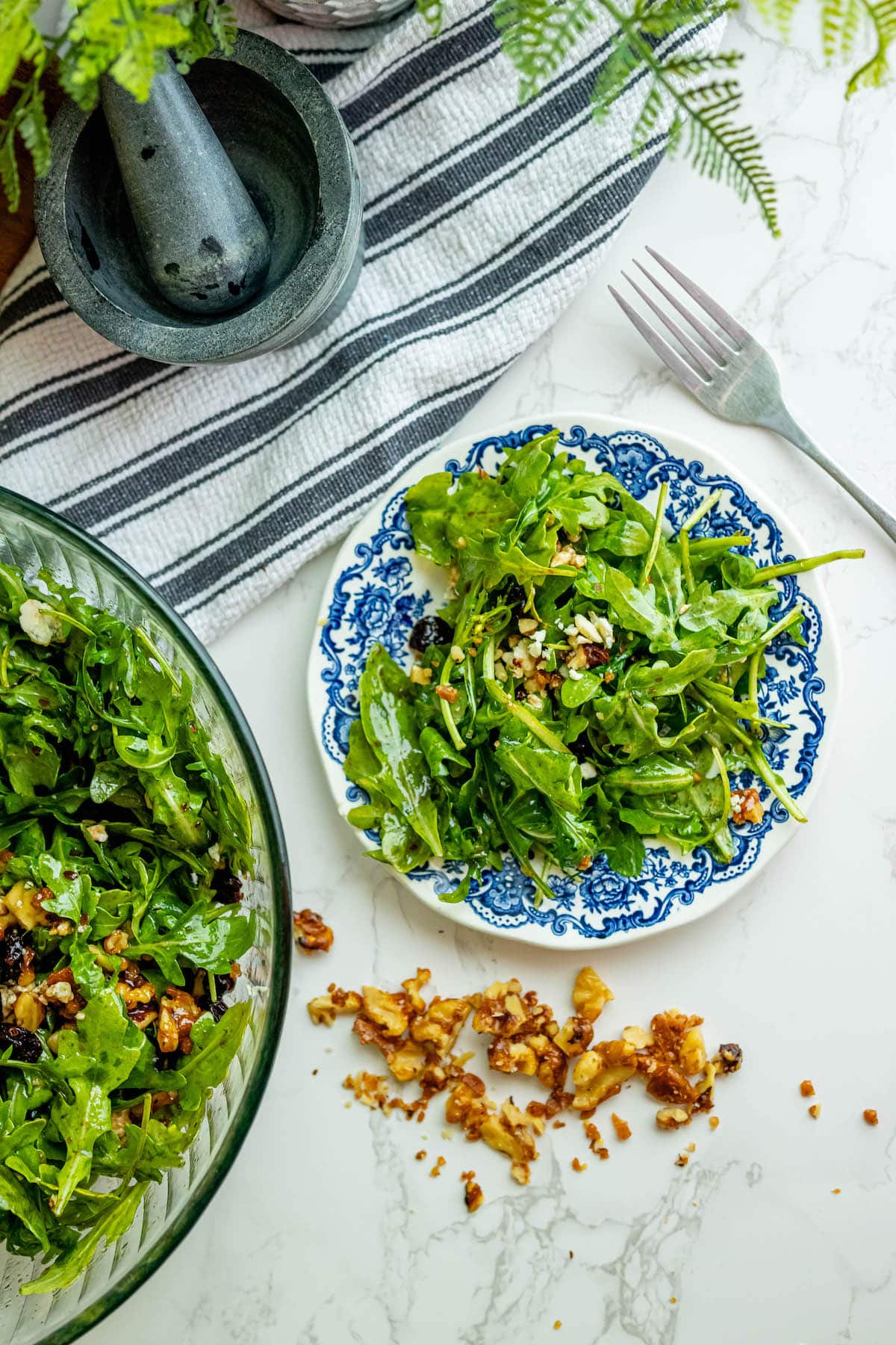 Arugula salad with walnuts.