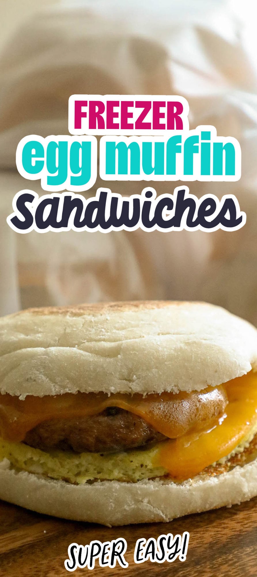 english muffin with sausage, cheese, and egg