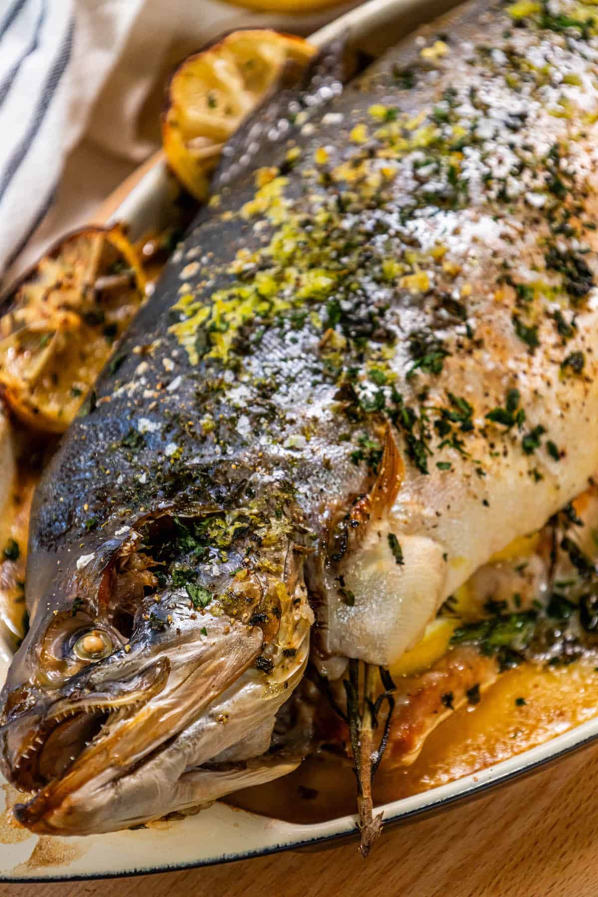 Herb Stuffed Roasted Arctic Char with lemons and herbs.