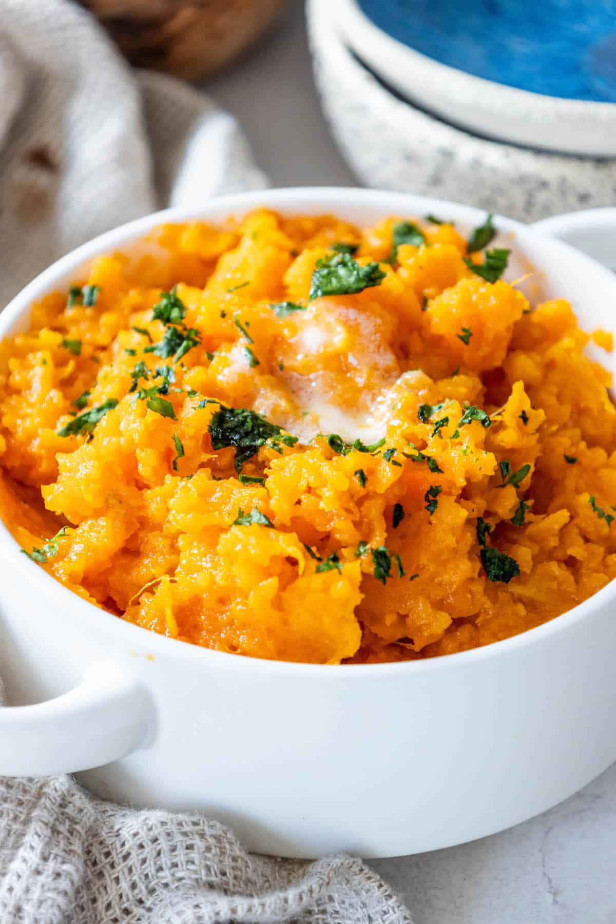 Mashed sweet potatoes in a bowl.