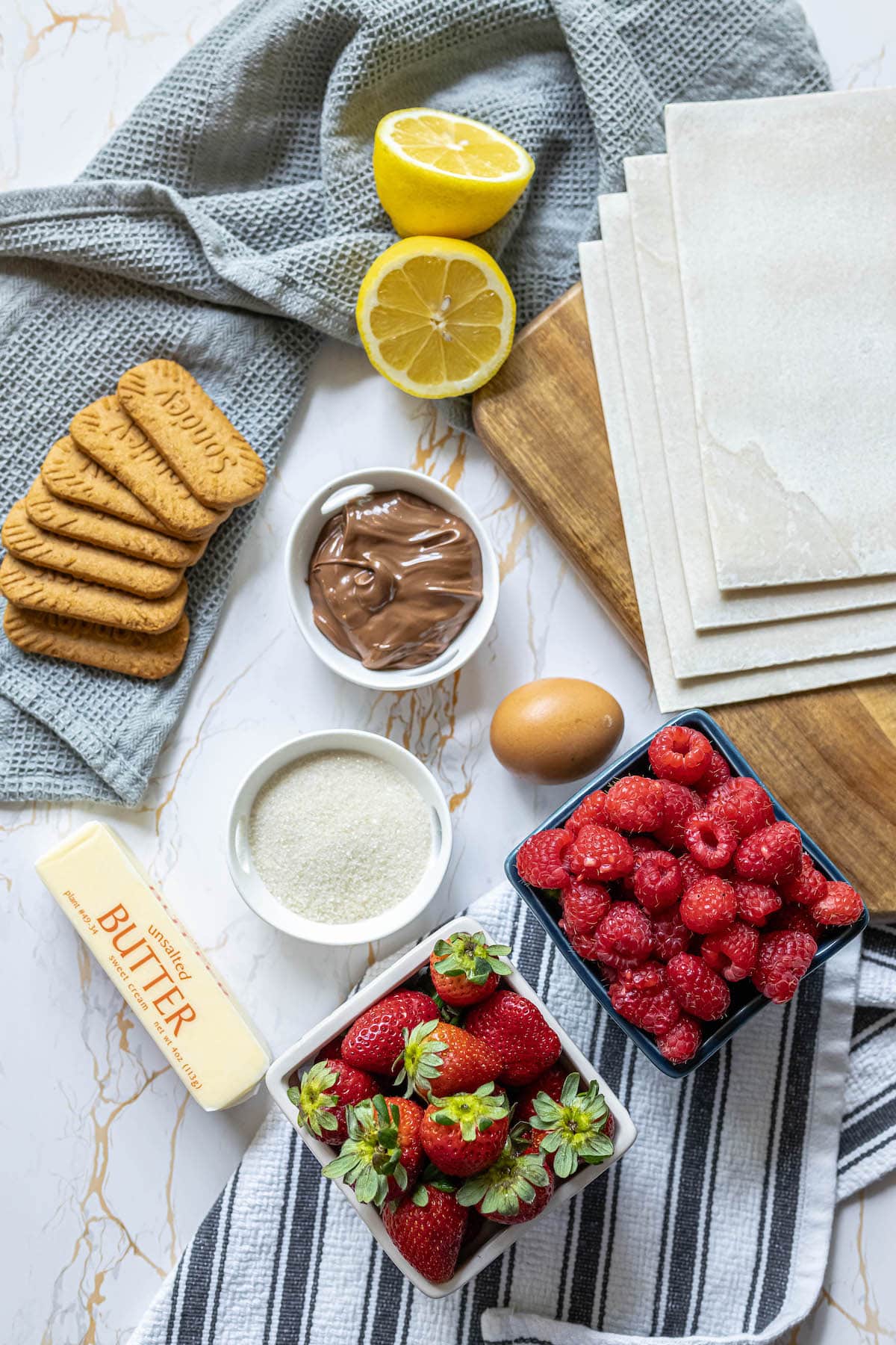 raspberry, strawberry, sugar, puff pastry, nutella, lemon, and butter