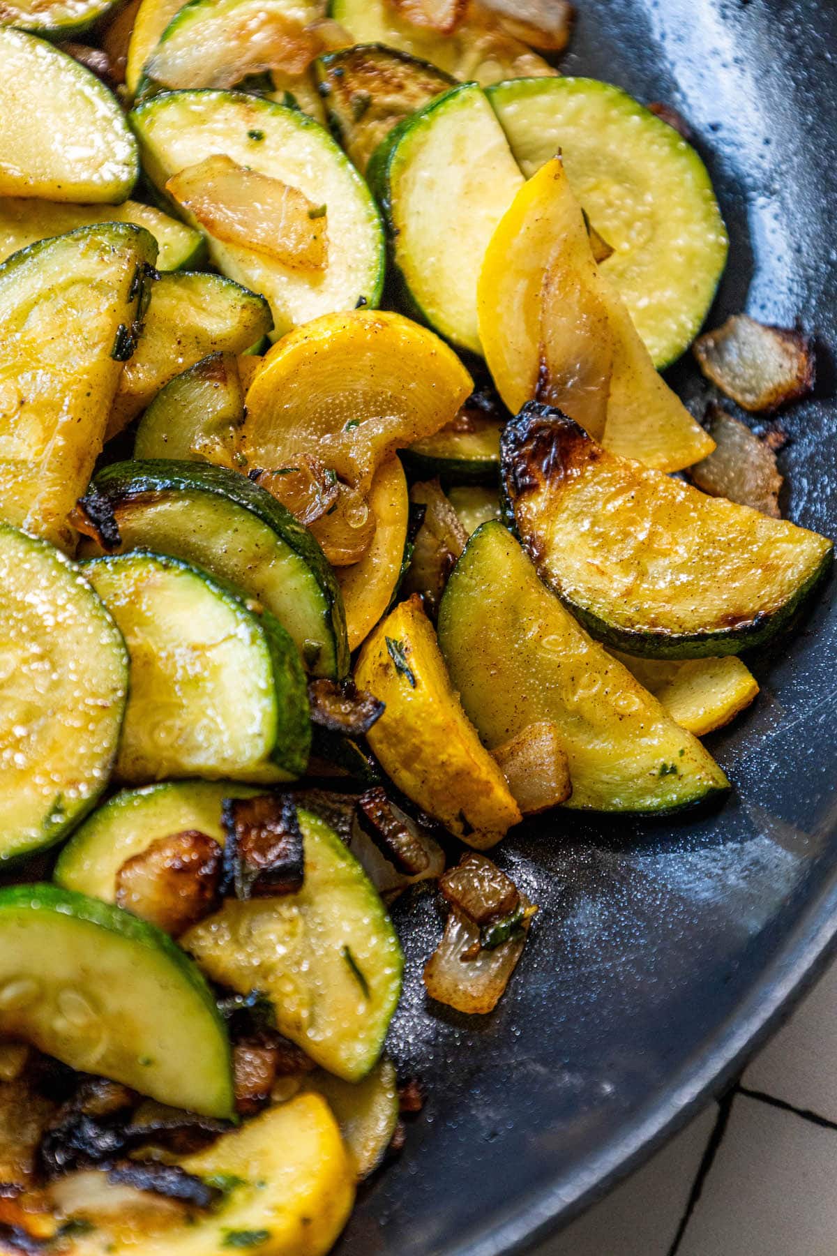 A sautéed side dish of zucchini and onions.