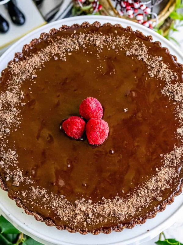 Silky chocolate tart with raspberries topping.