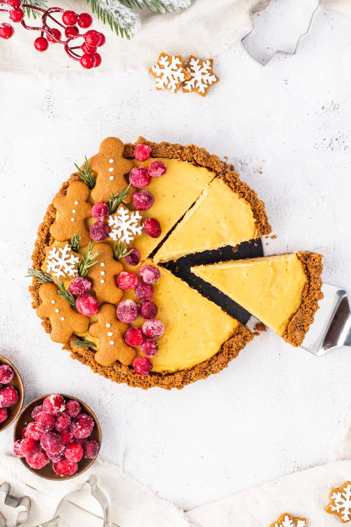 A gingerbread pie with a slice taken out of it, transformed into an Eggnog Tart.
