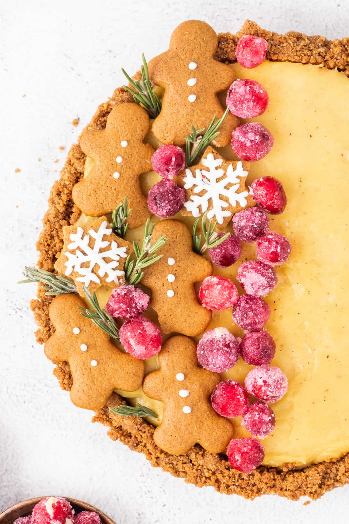 Gingerbread pie with cranberries and gingerbread cookies.