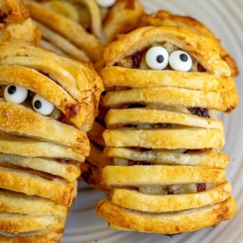 A plate of banana nutella mummies with eyes on them.