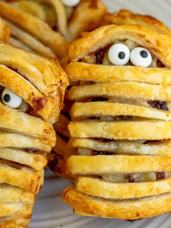 A plate of banana nutella mummies with eyes on them.
