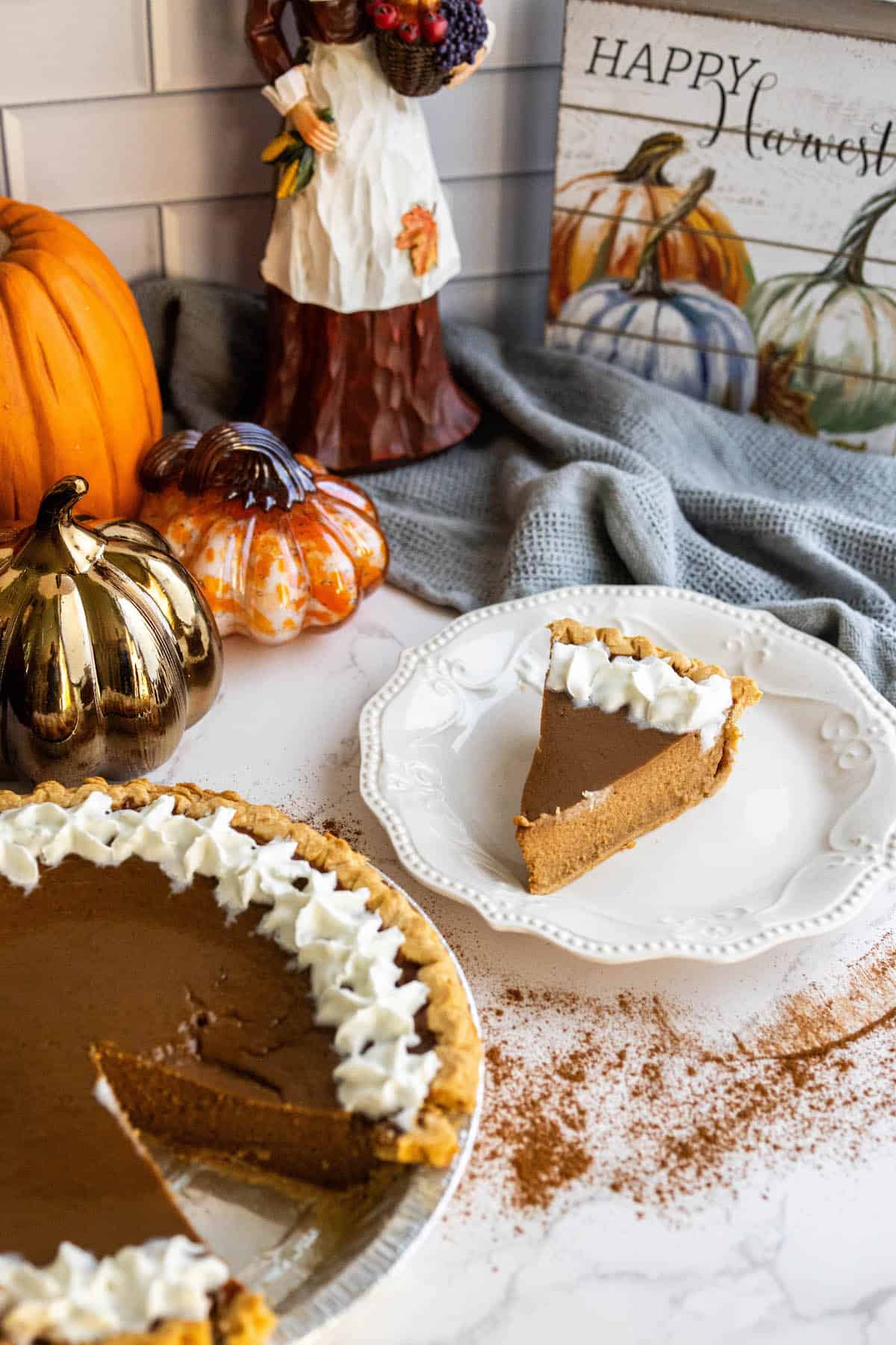 Pumpkin pie on a plate.