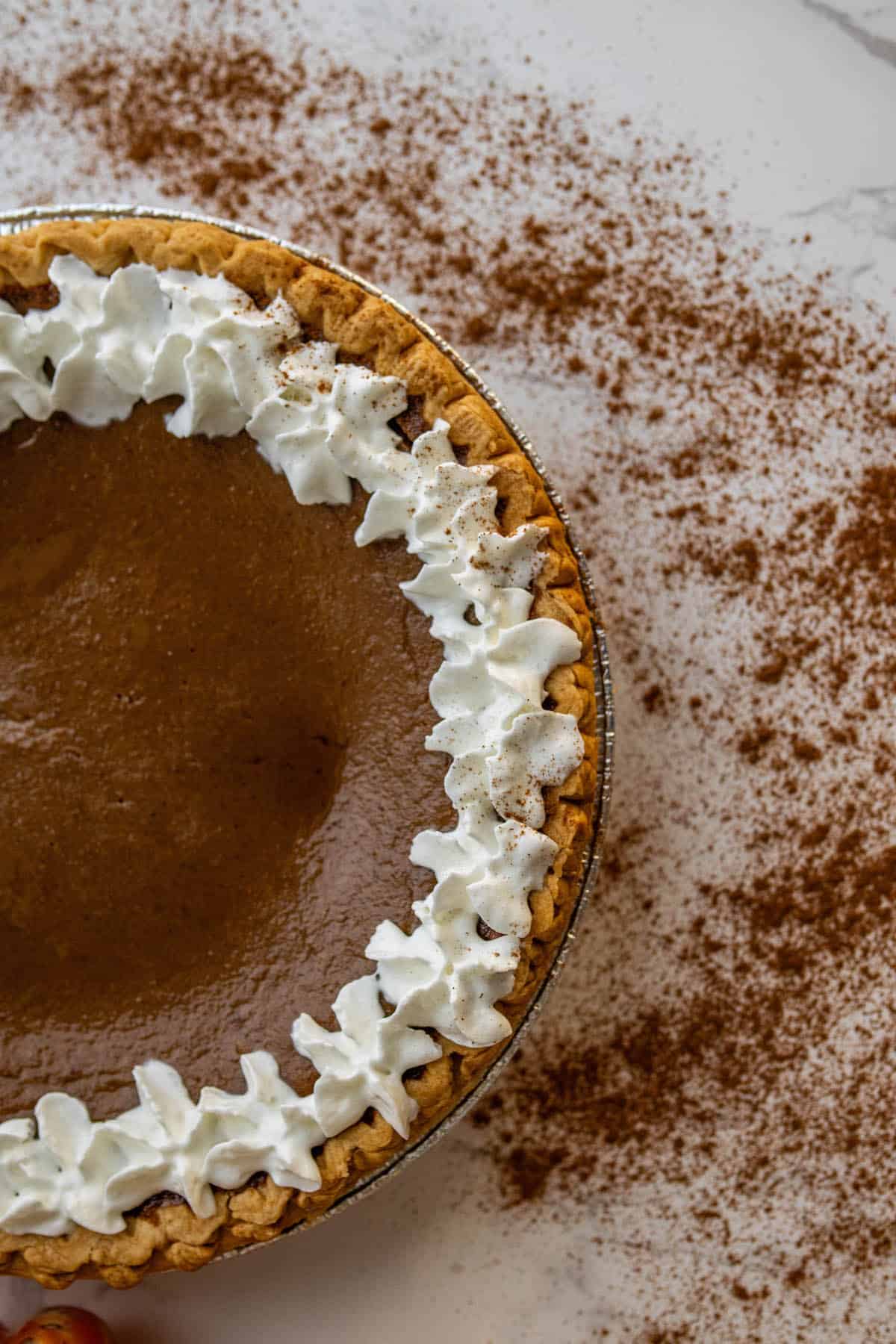 A close up of a delicious pumpkin pie.