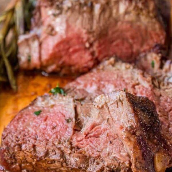 Steak on a wooden cutting board.