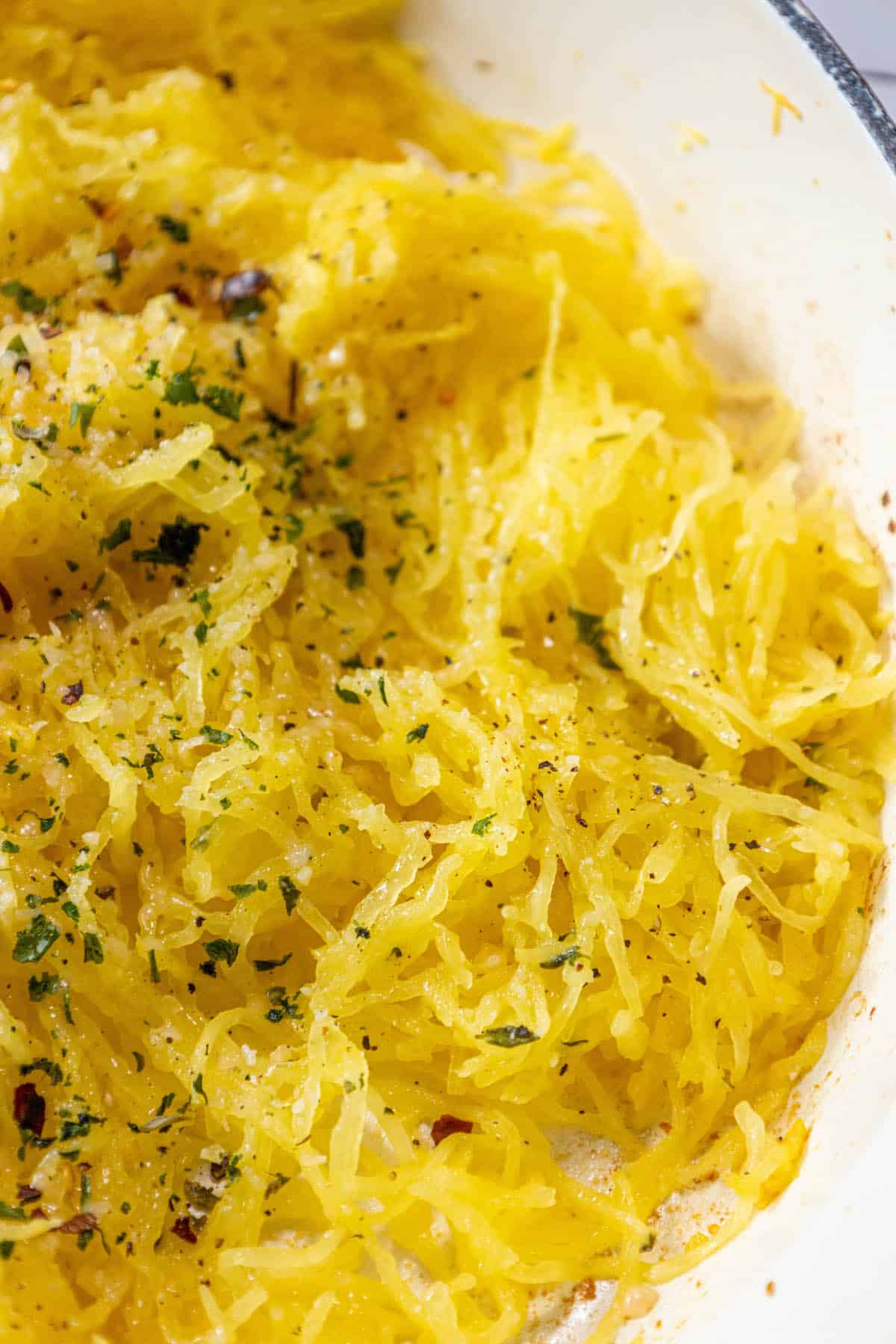 Easy spaghetti squash skillet with parmesan cheese.