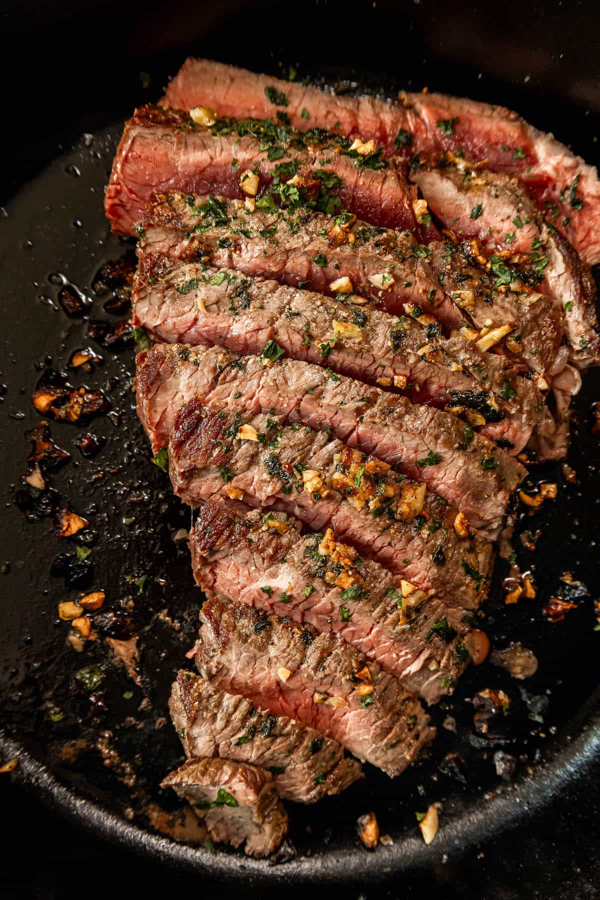 Keto London broil steak with herbs and spices.