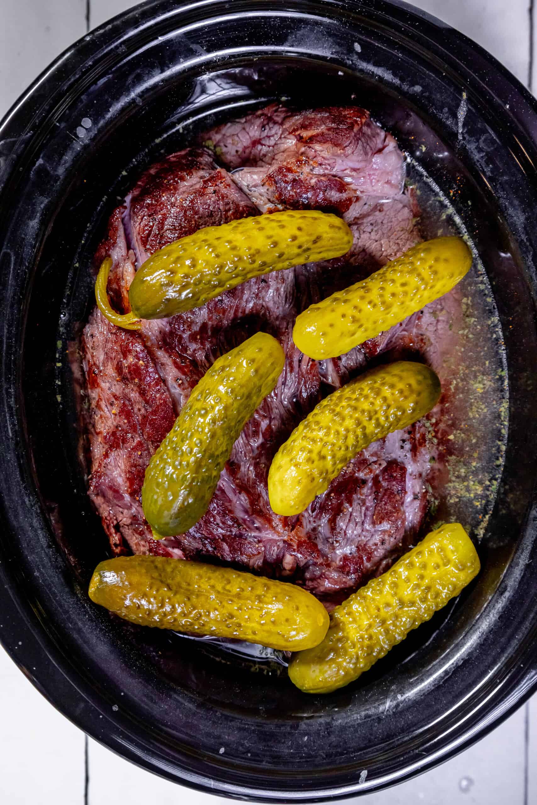 A pot roast filled with pickles.
