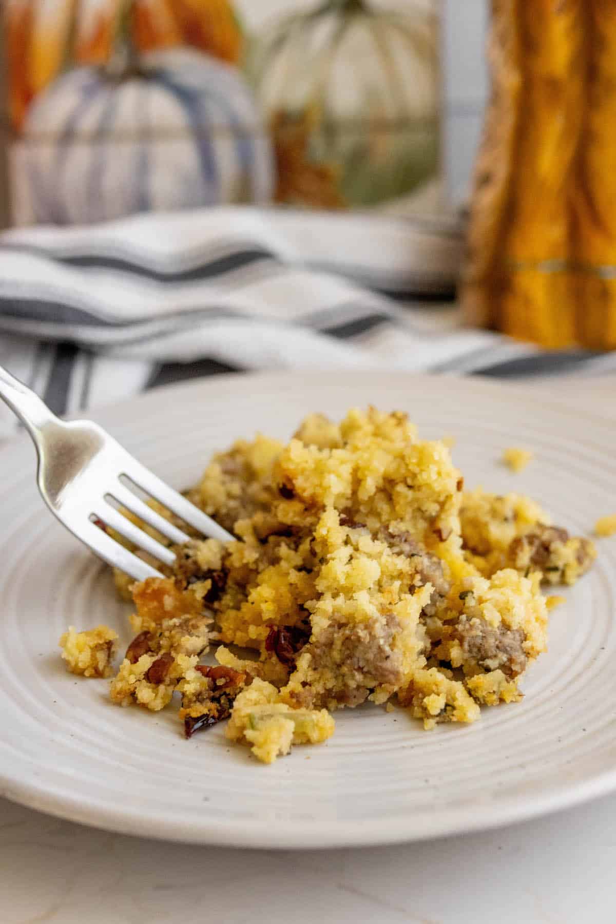 A plate of breakfast casserole with sausage.