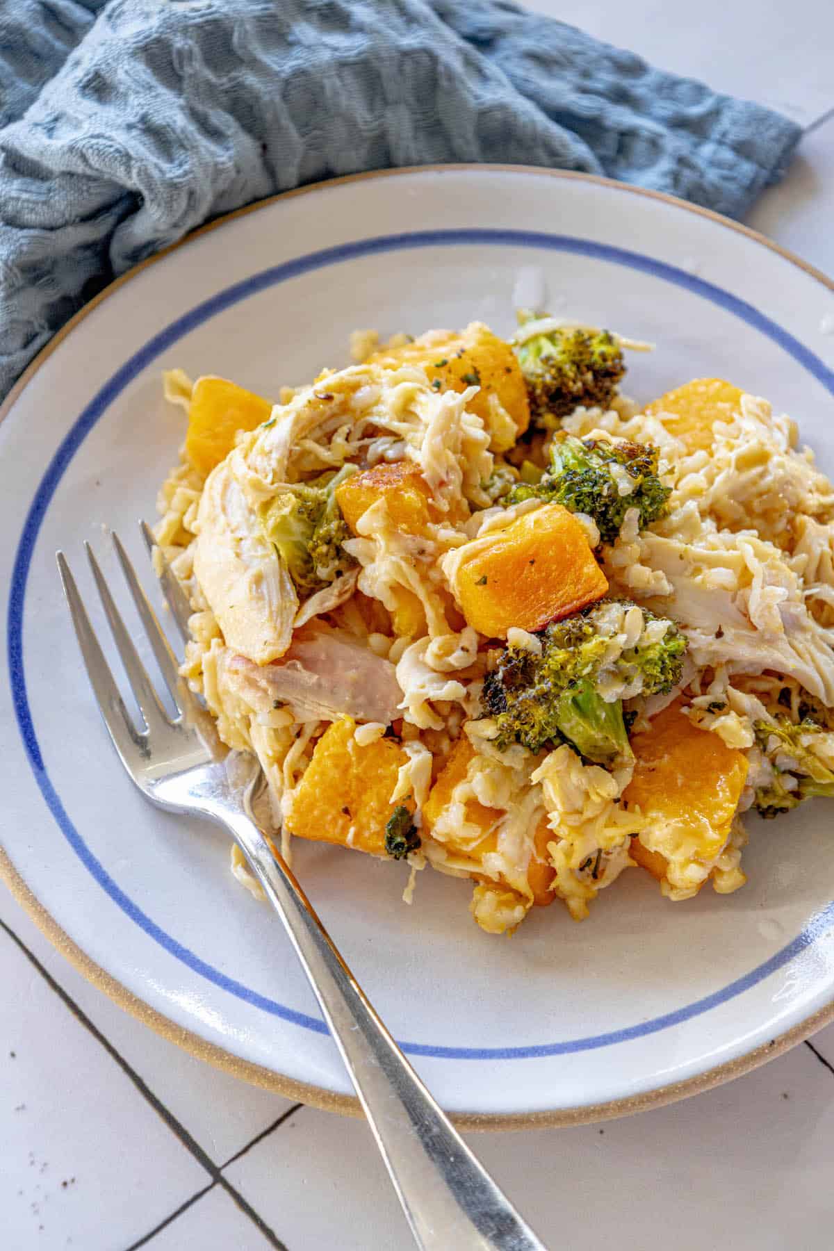 A plate with chicken, broccoli and rice on it.