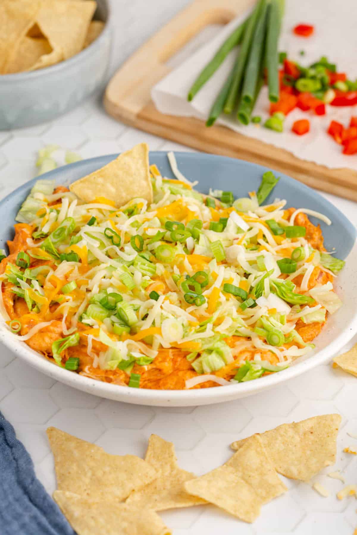 A hot dip of buffalo chicken served with tortilla chips.