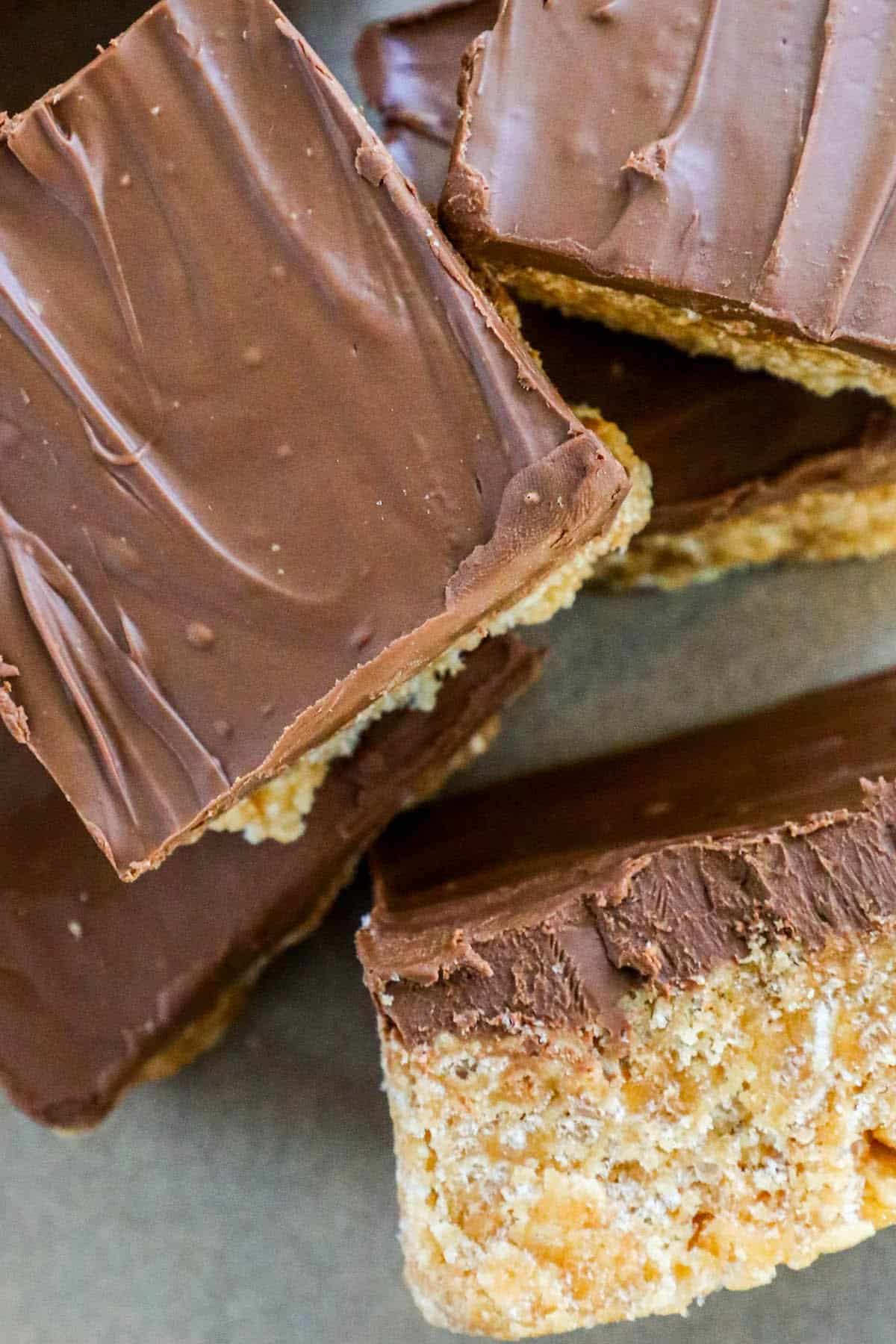 A stack of scotcheroos - chocolate covered graham cracker bars.