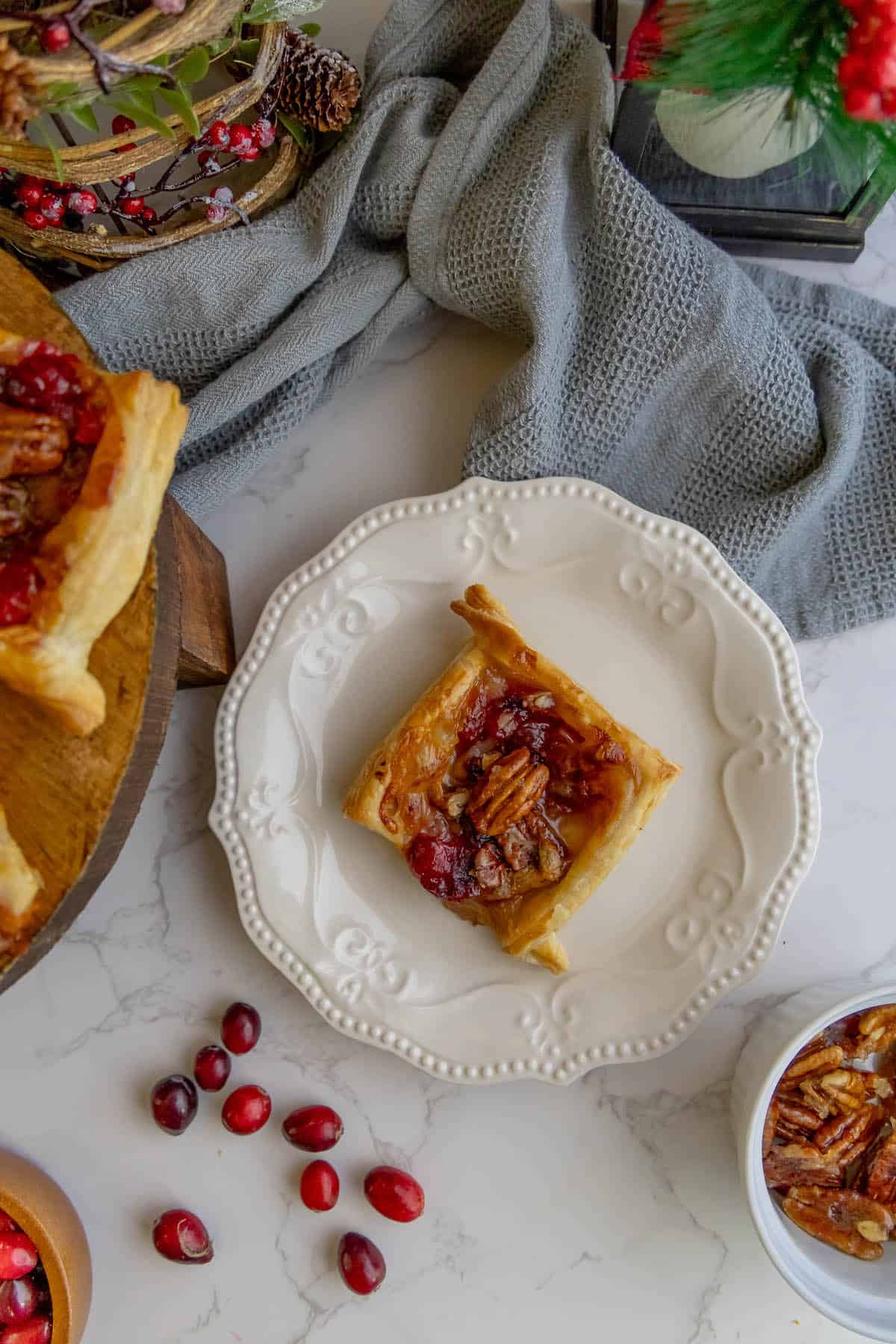 Cranberry brie bites with cranberries, pecans
