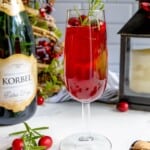 A glass of cranberry champagne sparkler.