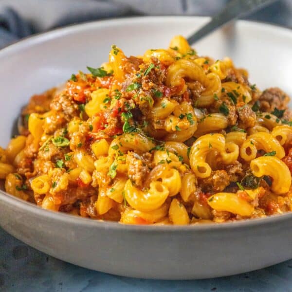 An American goulash recipe featuring pasta, meat, and sauce.