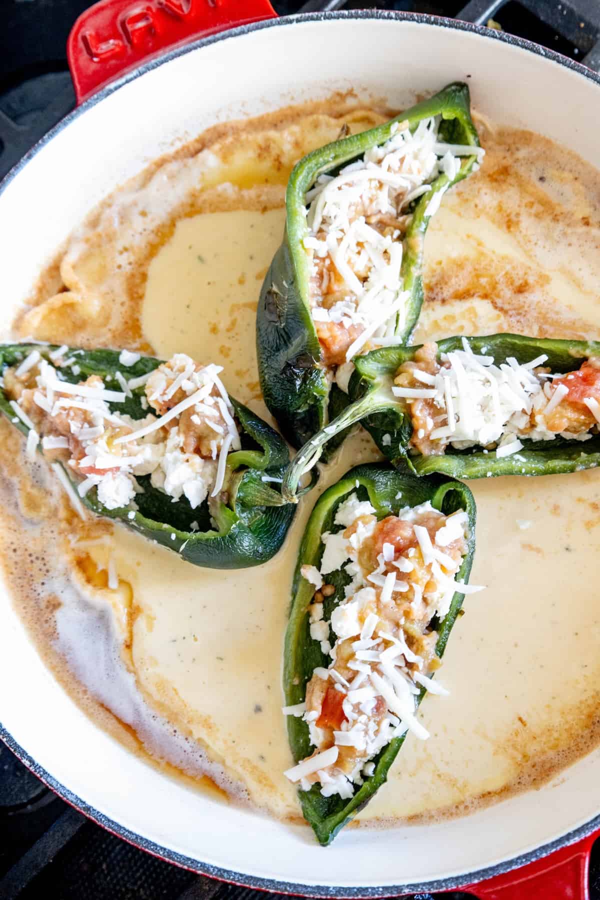 Chile Relleno cooked in a skillet.