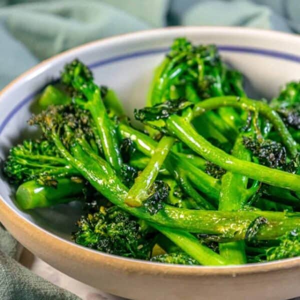 Chinese broccoli in a bowl on a table.