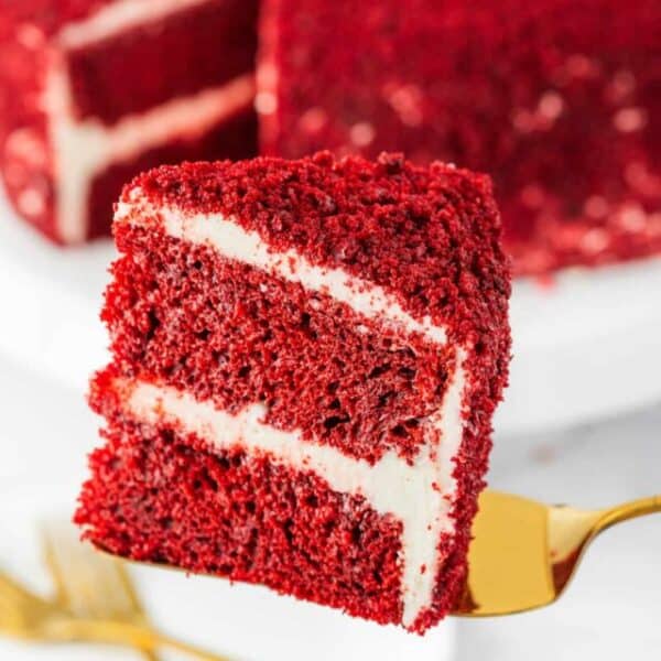 A piece of red velvet cake on a fork.