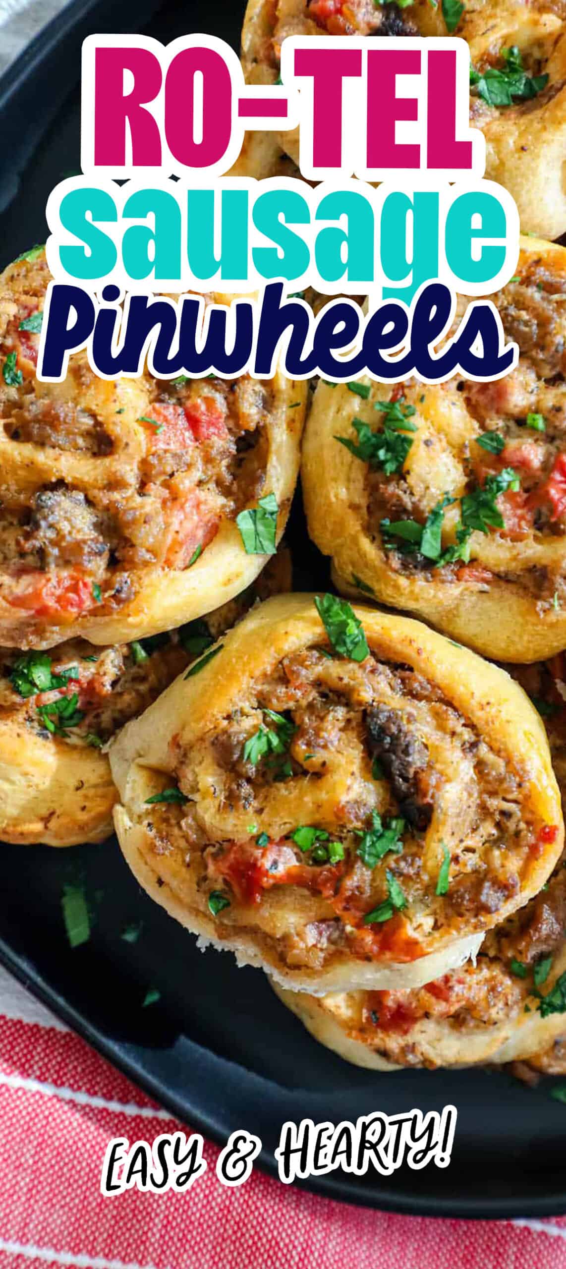 Baked sausage cheese pinwheels on a plate.