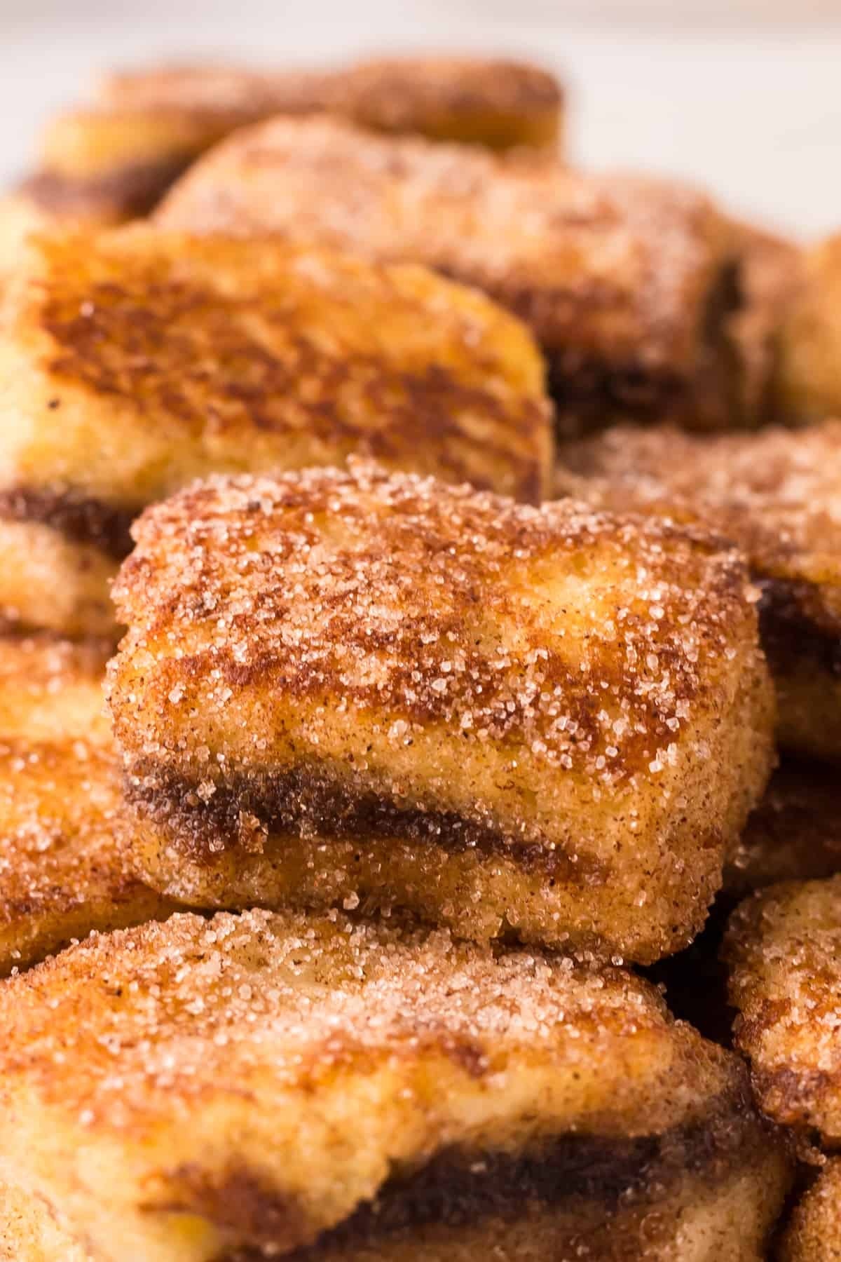 A stack of cinnamon sugar French toast bites.