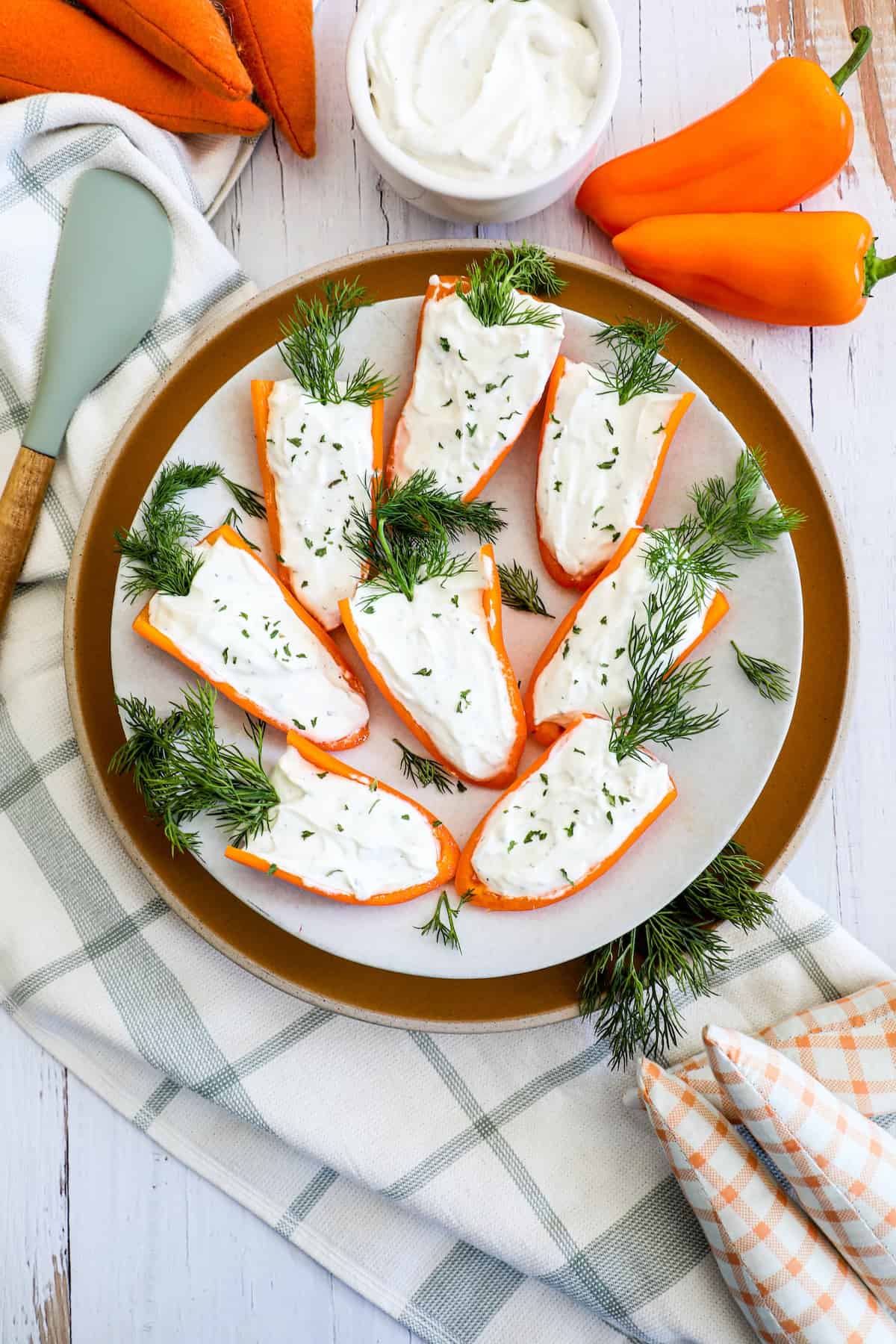A plate with carrots and sour cream.