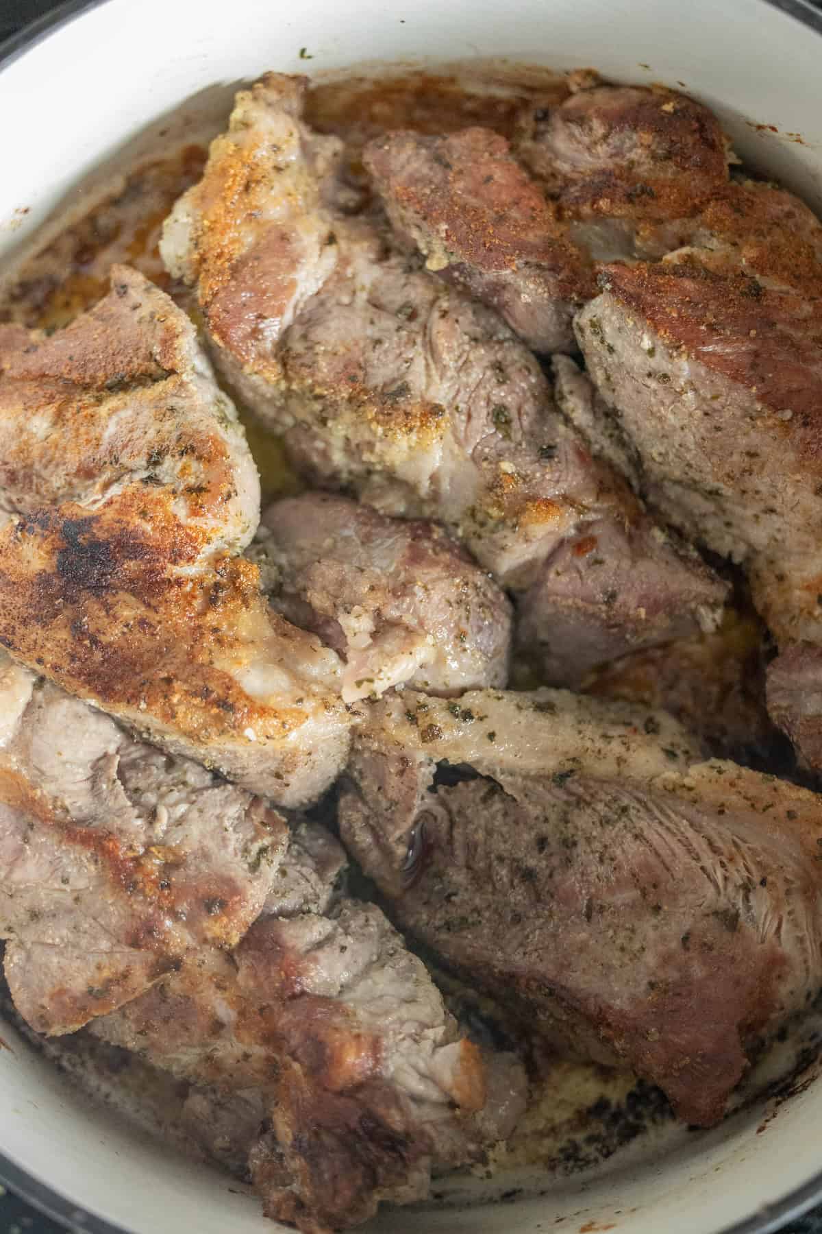 Tender country-style ribs braised with paprika, cooked to perfection in a pot.