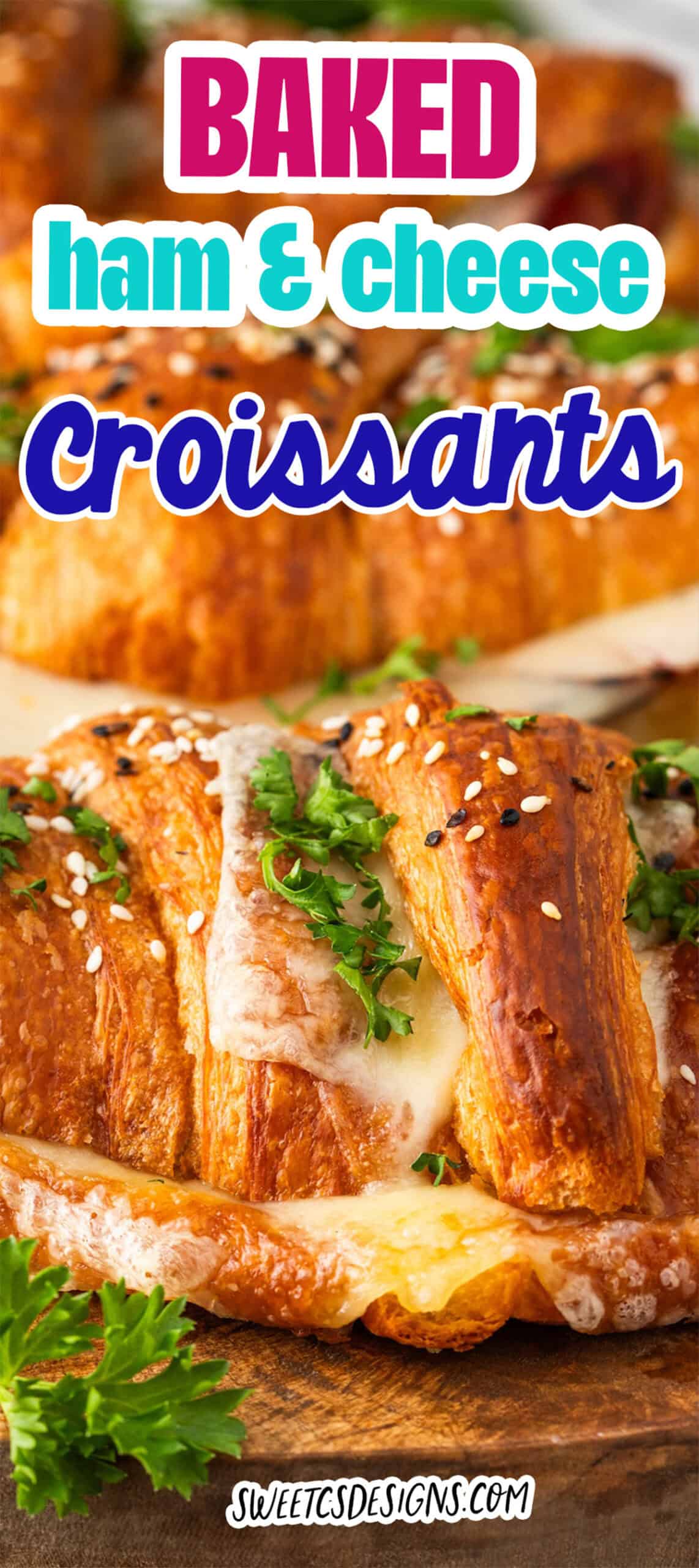 Close-up of baked ham and cheese croissants topped with melted cheese, sesame seeds, and chopped parsley—perfect for those who crave the best baked ham and cheese sandwiches. Garnished with fresh parsley on the side.