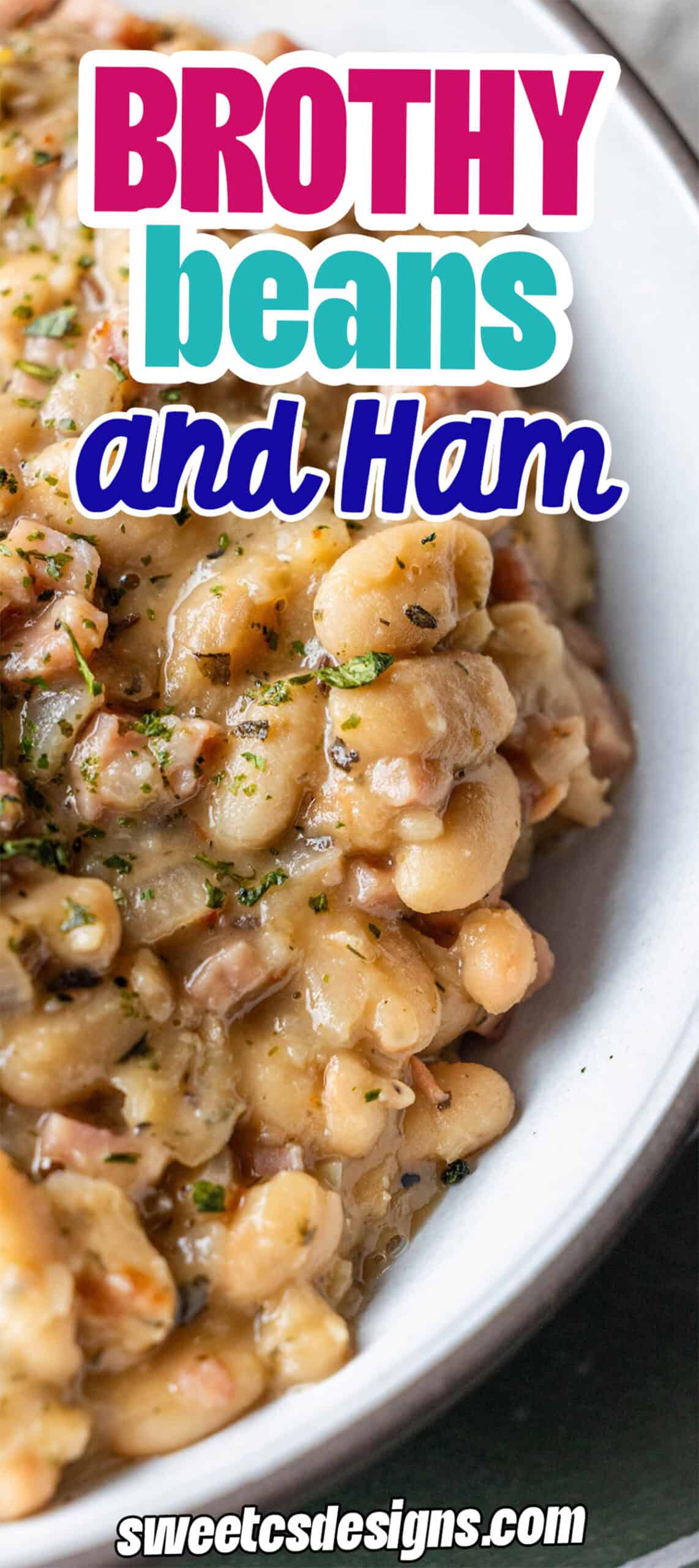 Close-up of a bowl filled with brothy ham and beans, garnished with fresh herbs and a hint of caraway. Text over the image reads "Brothy beans and Ham.