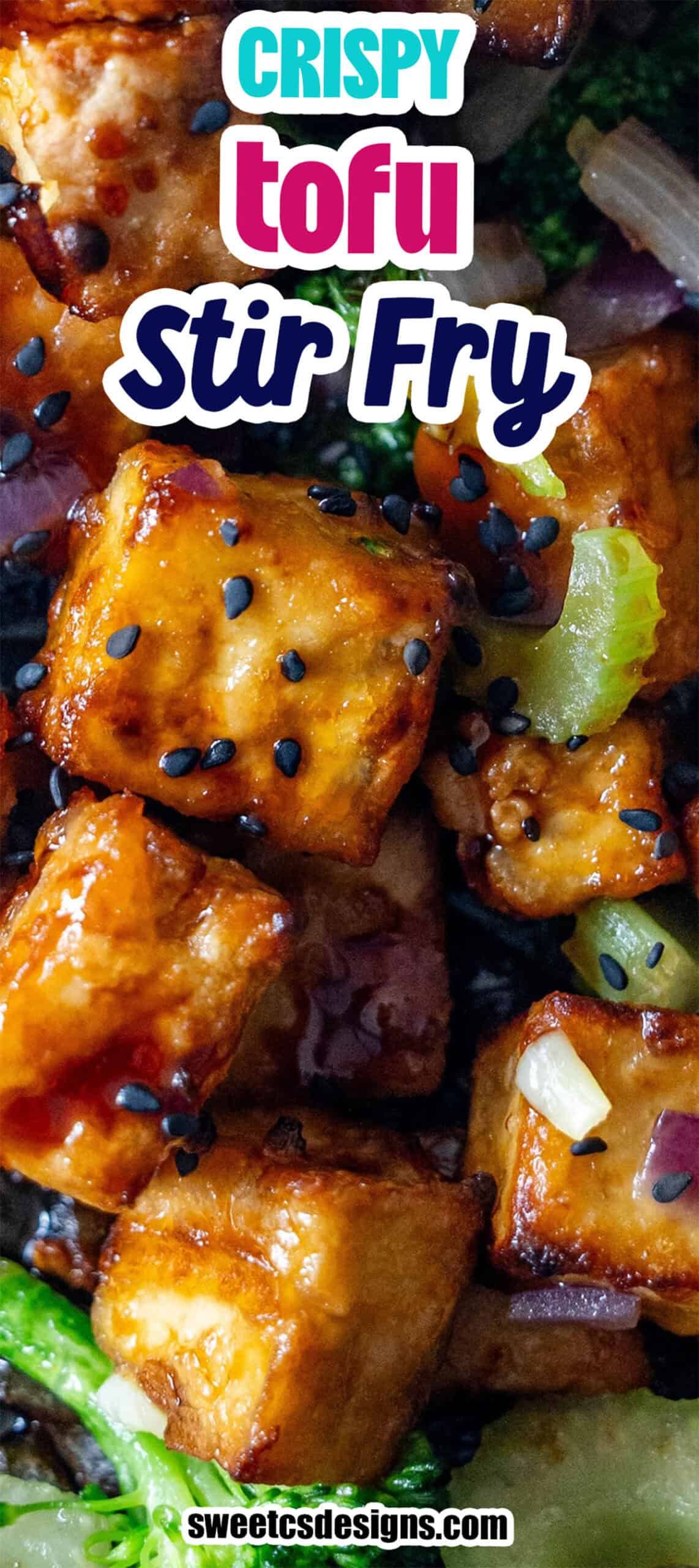 Close-up of golden Crispy Tofu cubes with black sesame seeds, fresh vegetables, and savory sauce, labeled "Tofu Stir Fry" with a website credit at the bottom.