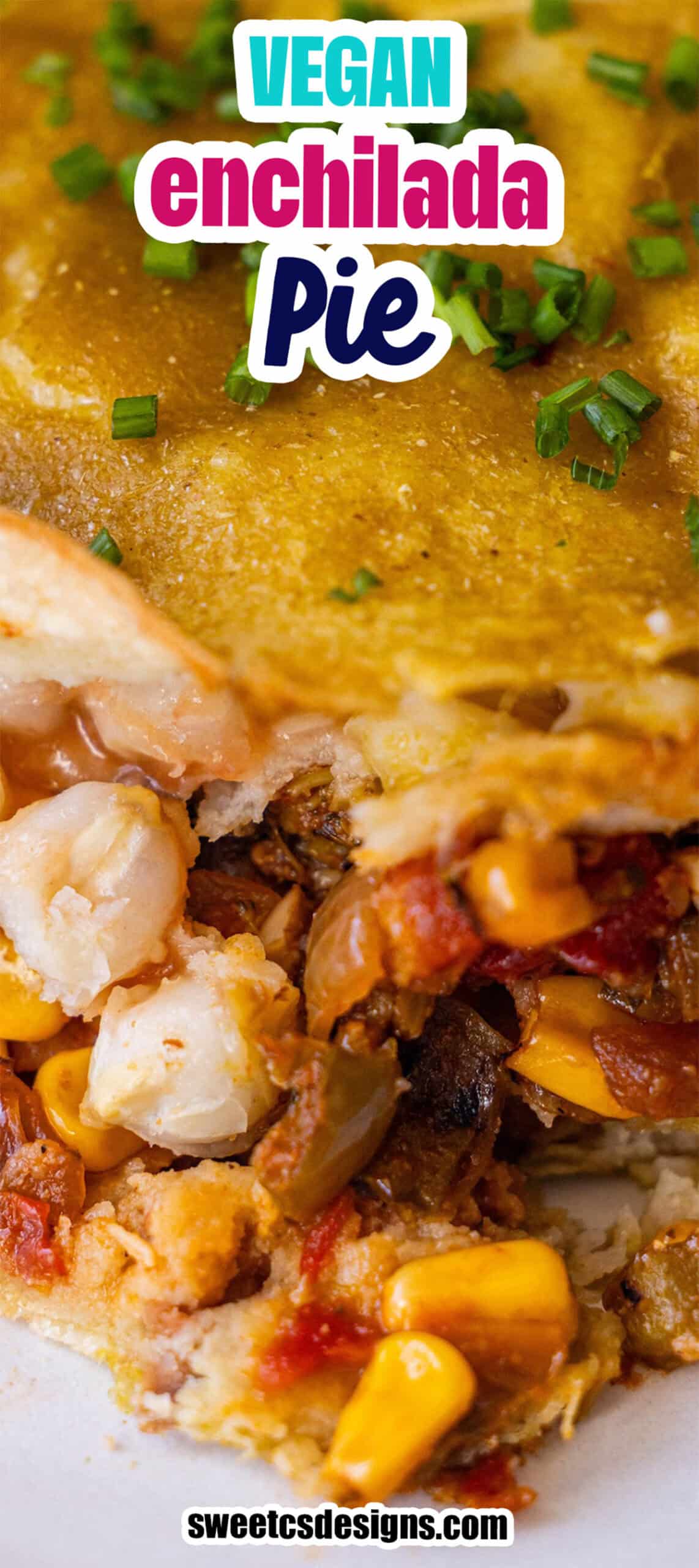 Close-up of a Vegan Enchilada Pie slice, showcasing layers of vegetables, cheese, and sauce, all topped with fresh chives. Text overlay reads "Vegan Enchilada Pie," with the website URL displayed at the bottom.