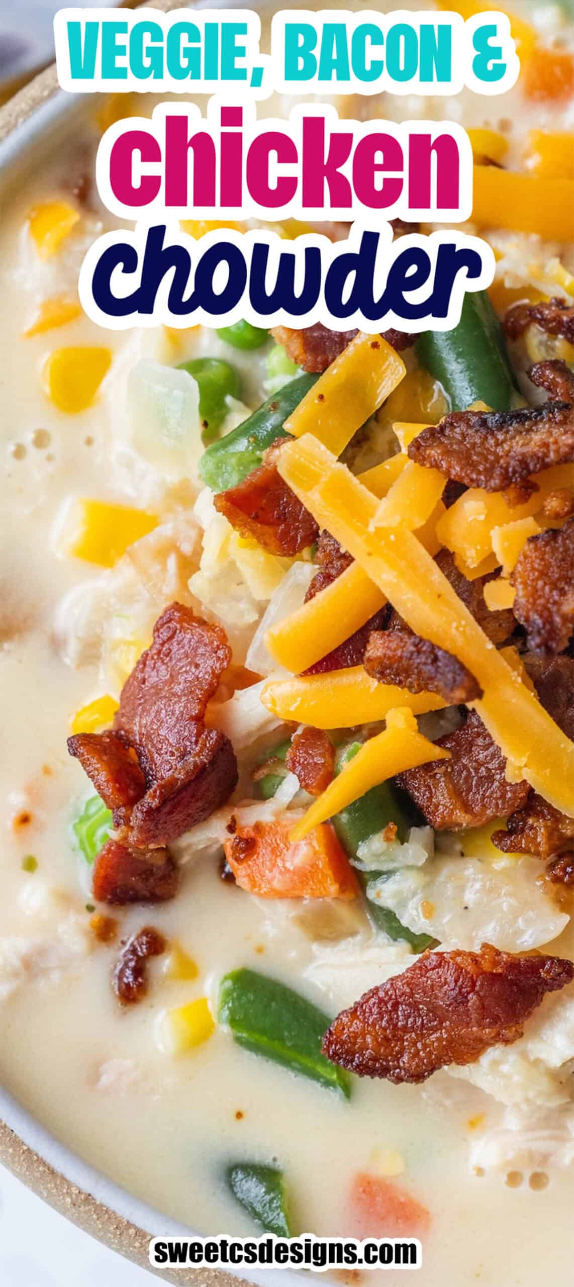 Close-up of Cheesy Bacon Chicken Corn Chowder topped with shredded cheddar cheese and crispy bacon pieces&mdash;an easy chowder recipe packed with veggies, chicken, and flavor.