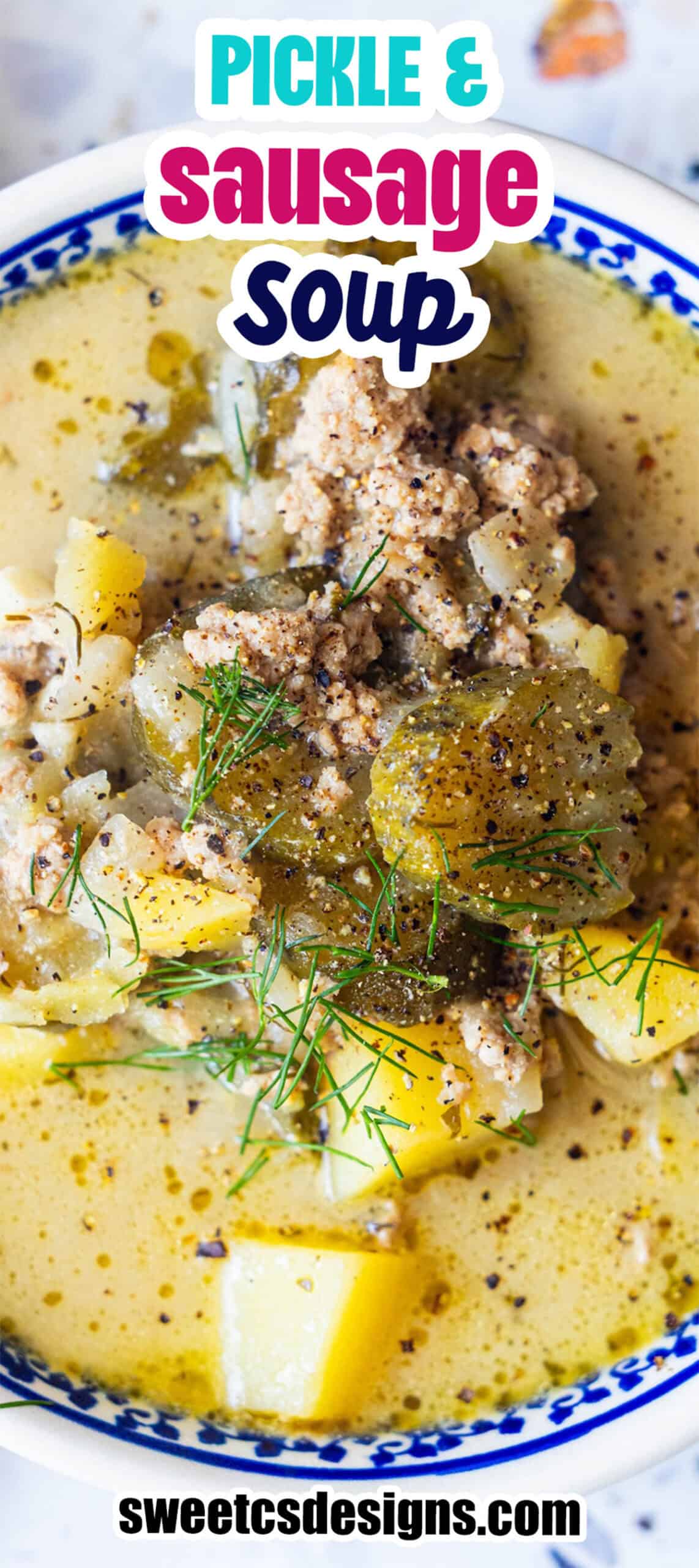 A comforting bowl of Dill Pickle and Sausage Soup, featuring hearty chunks of sausage, potatoes, pickles, fresh herbs, and savory broth, served in a blue-rimmed bowlโthis easy pickle soup with meat is perfect for a cozy meal.
